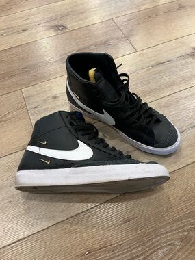 Nike Black White High-Top Sneakers with Gold Accents